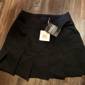 Puma woman golf skirt. Size small new tags